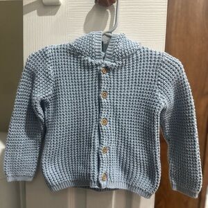 Baby blue knitted sweater with ears on hood